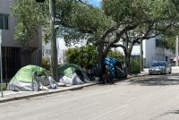 A photo of tents on the street in Miami.